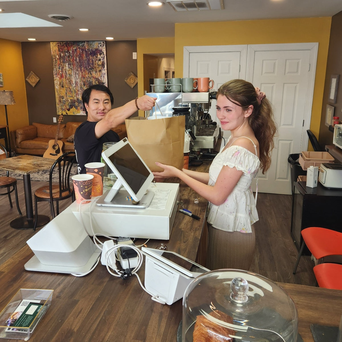 Josiah delivering Third Horse Coffee to Bean Ability Coffee Café, a community partner