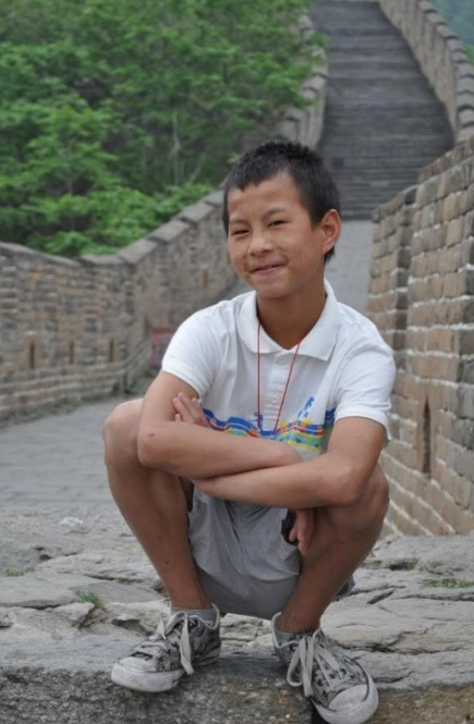 Josiah on the Great Wall of China during his adoption trip